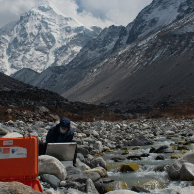 Sampling a glacier-fed stream in the Langtang region (Matteo Tolosano)